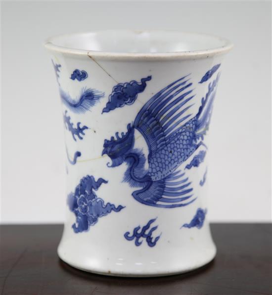 A Chinese blue and white waisted brush pot, Jiajing mark, Kangxi period, 13cm., broken and re-stuck